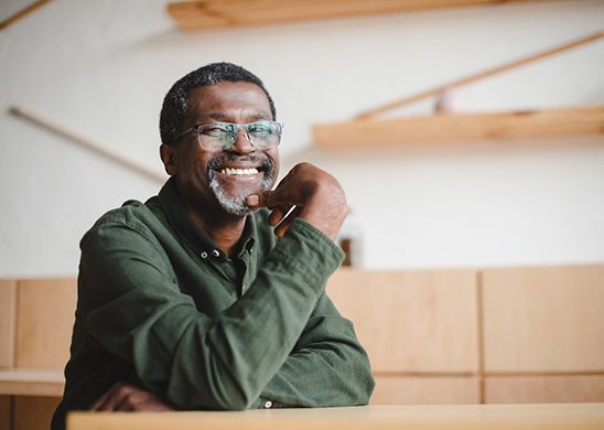 Man smiling with All-On-4 in Juno Beach