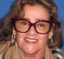 Close up of woman in Juno Beach showing imperfect teeth