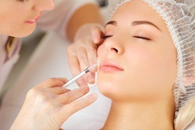 A woman receiving a Botox injection