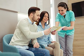 dental professional explaining additional financing options