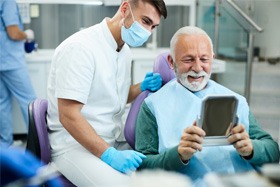 Man wearing dentures in Juno Beach 