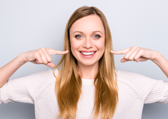 Woman with perfect teeth thanks to veneers near Jupiter, FL