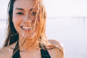 smiling woman on beach