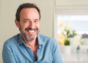 smiling older man with tooth-colored fillings