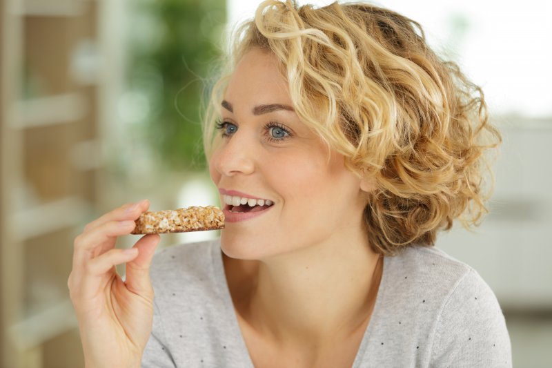 woman eating a snack