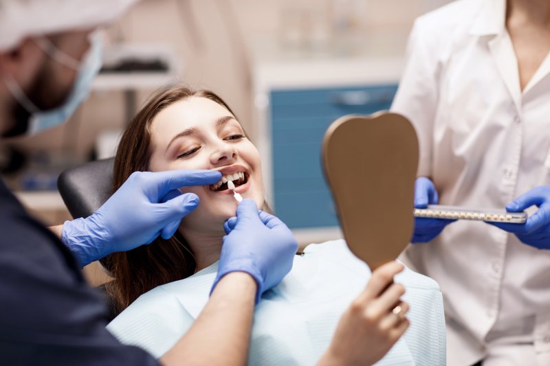 young woman getting cosmetic dentistry in Juno Beach