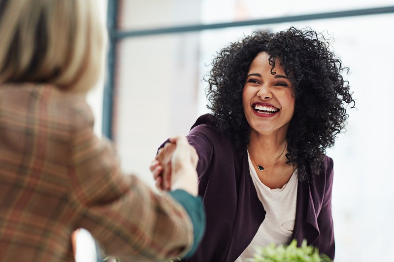 woman smiling in a job interview