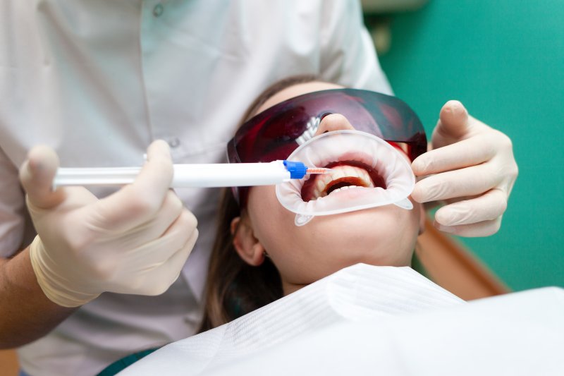 woman having her teeth whitened