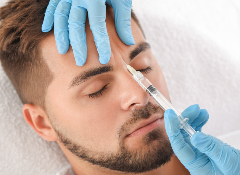Man getting BOTOX injection in forehead